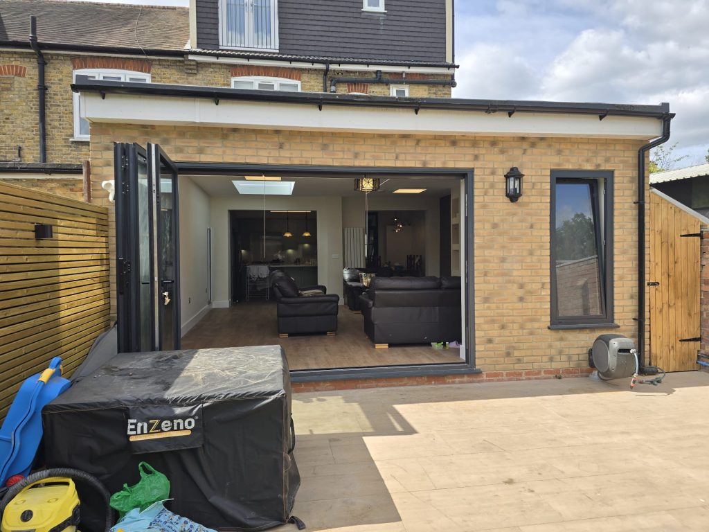 Summerhouse & house extension and paving & ladnscaping in Barking side