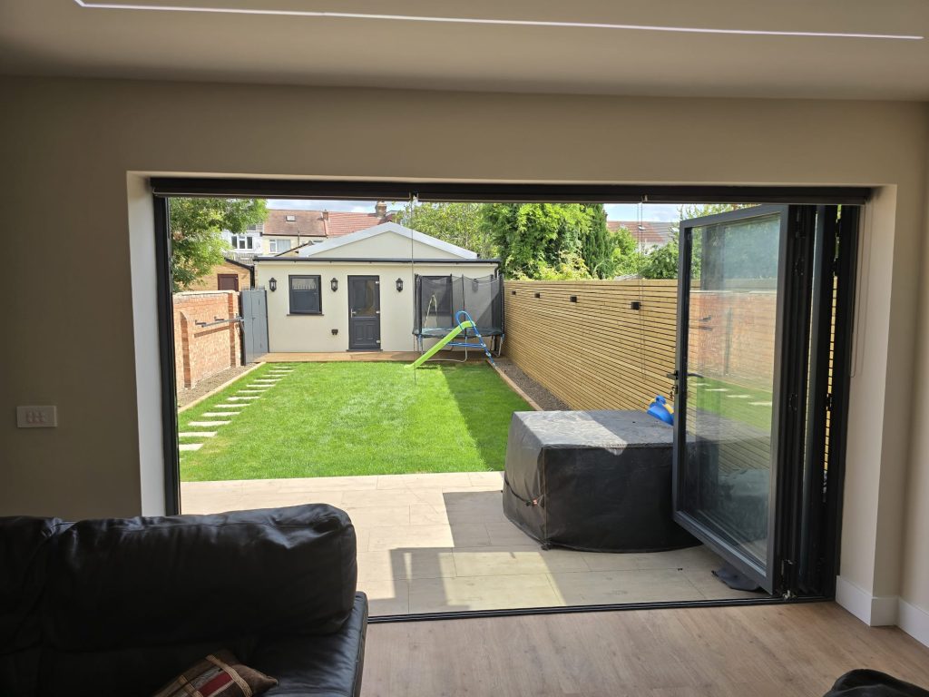 Summer house & house extension and paving & ladnscaping in Barking side